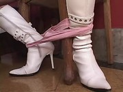 Tgirl in white boots does BJ to guy